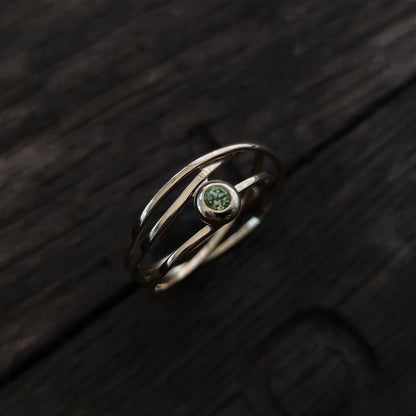 Ring :aria: | Verspielter Wickelring aus Gelbgold mit Peridot